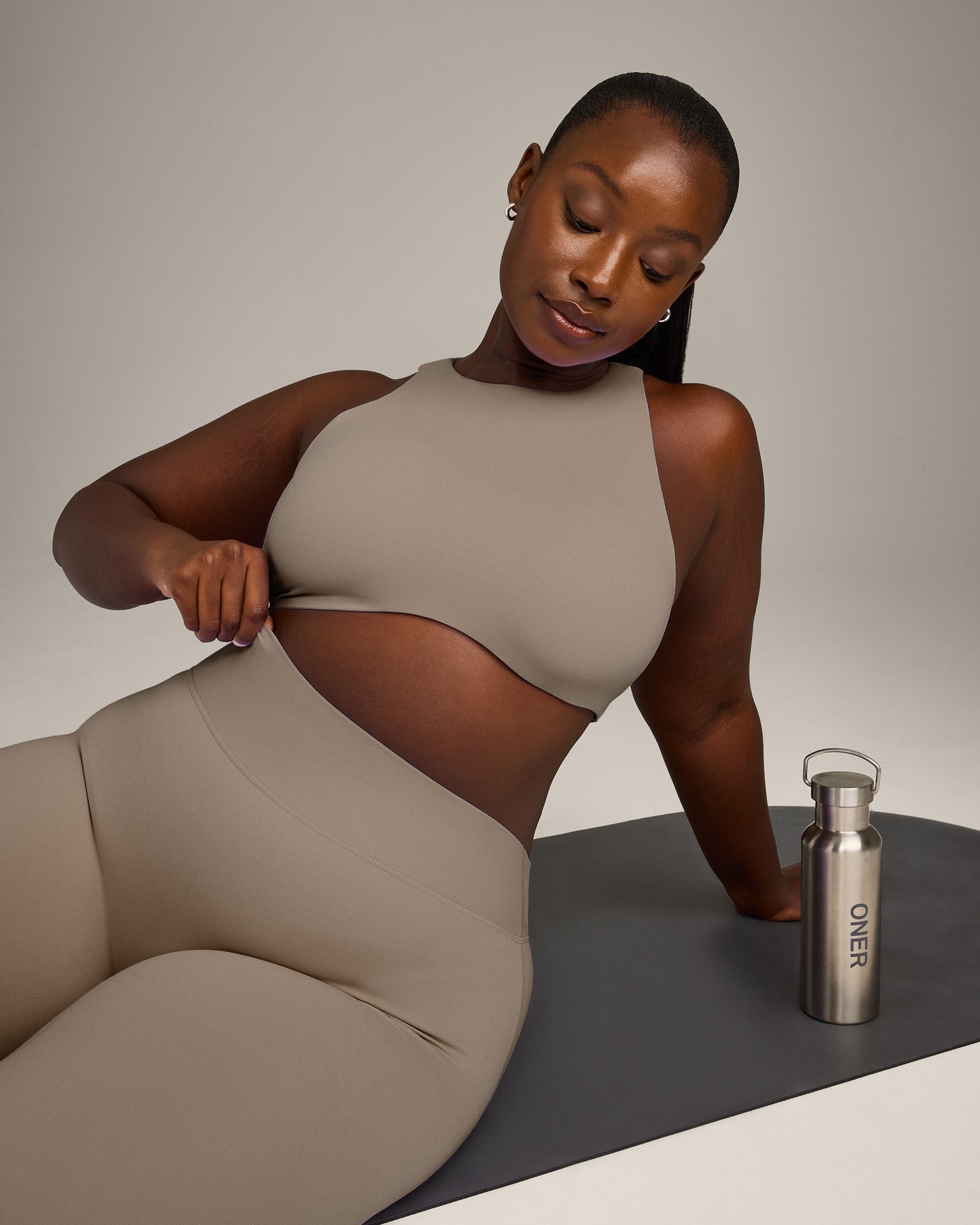 SoftMotion™ High Neck Sports Bra with Gray Logo | Minky