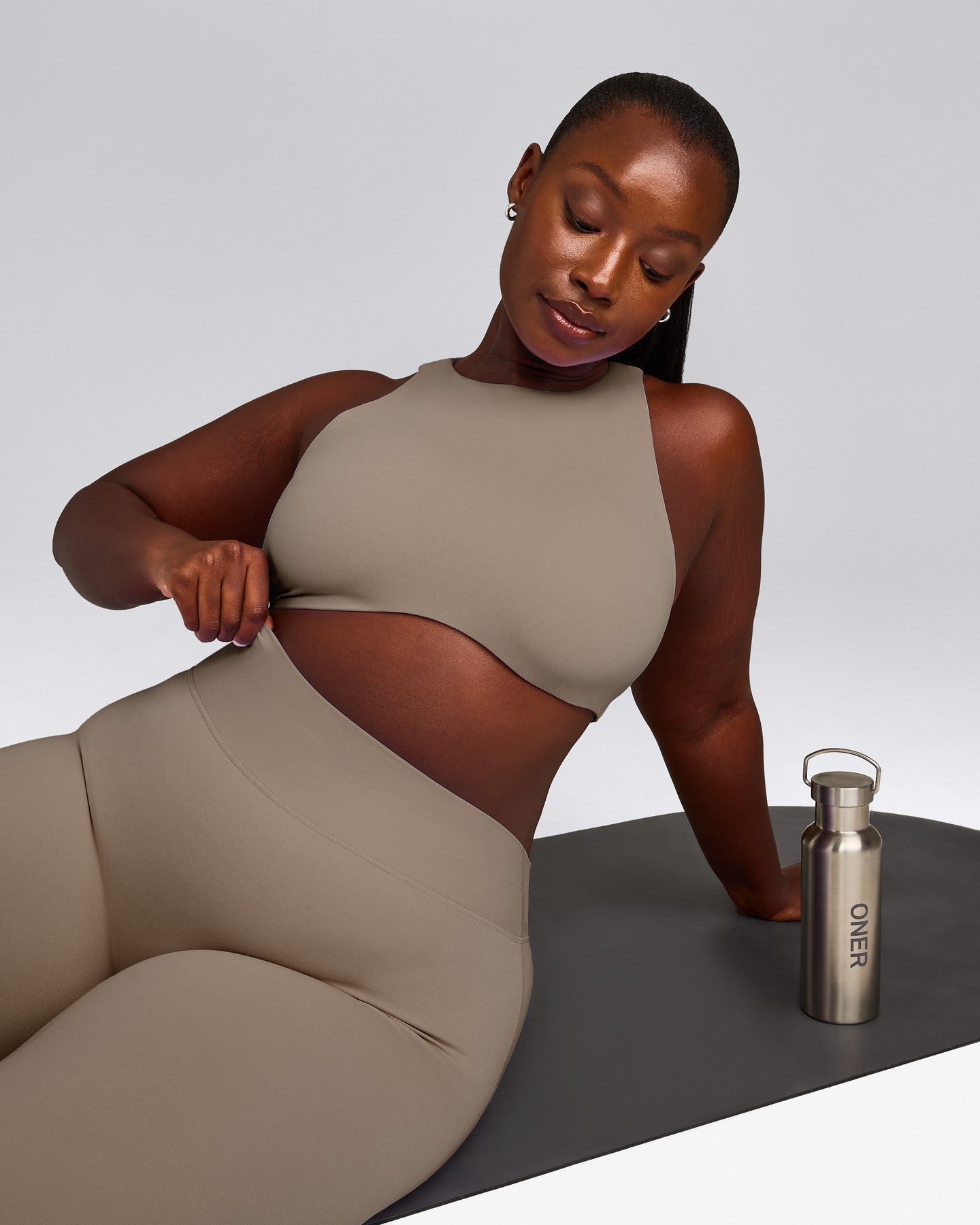 SoftMotion™ High Neck Sports Bra with Gray Logo | Minky