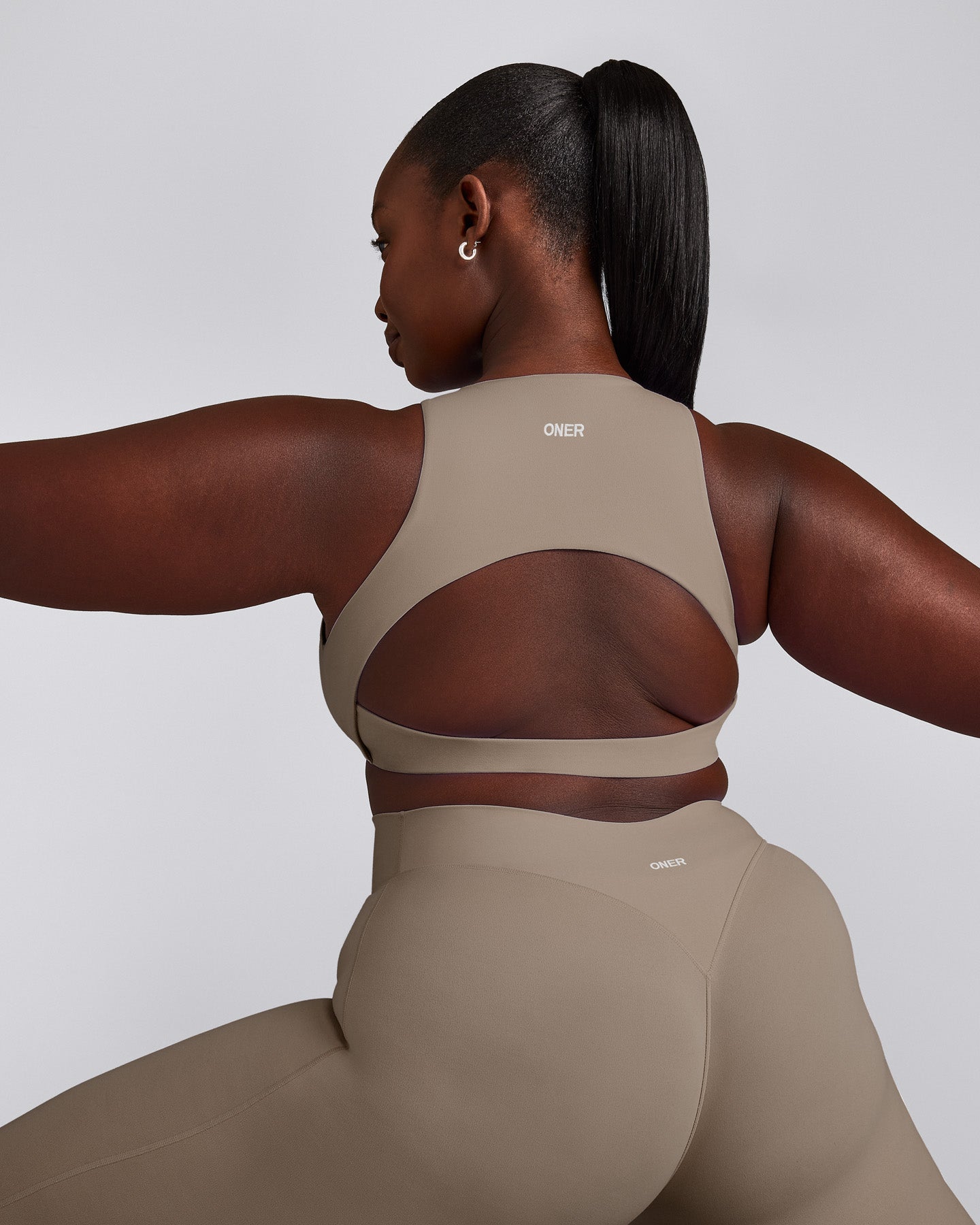 SoftMotion™ High Neck Sports Bra with Gray Logo | Minky