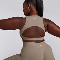 SoftMotion™ High Neck Sports Bra with Gray Logo | Minky