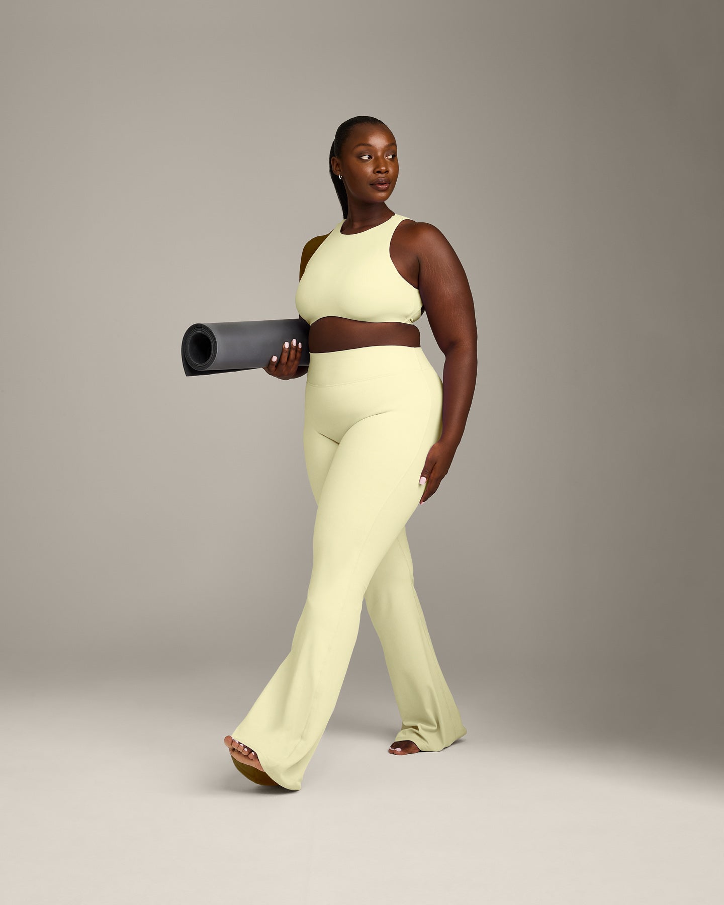 SoftMotion™ High Neck Sports Bra with Gray Logo | Pastel Yellow