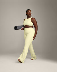 SoftMotion™ High Neck Sports Bra with Gray Logo | Pastel Yellow