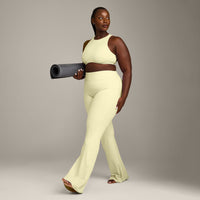 SoftMotion™ High Neck Sports Bra with Gray Logo | Pastel Yellow