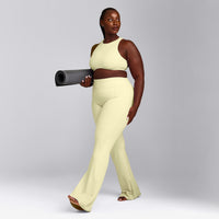 SoftMotion™ High Neck Sports Bra with Gray Logo | Pastel Yellow