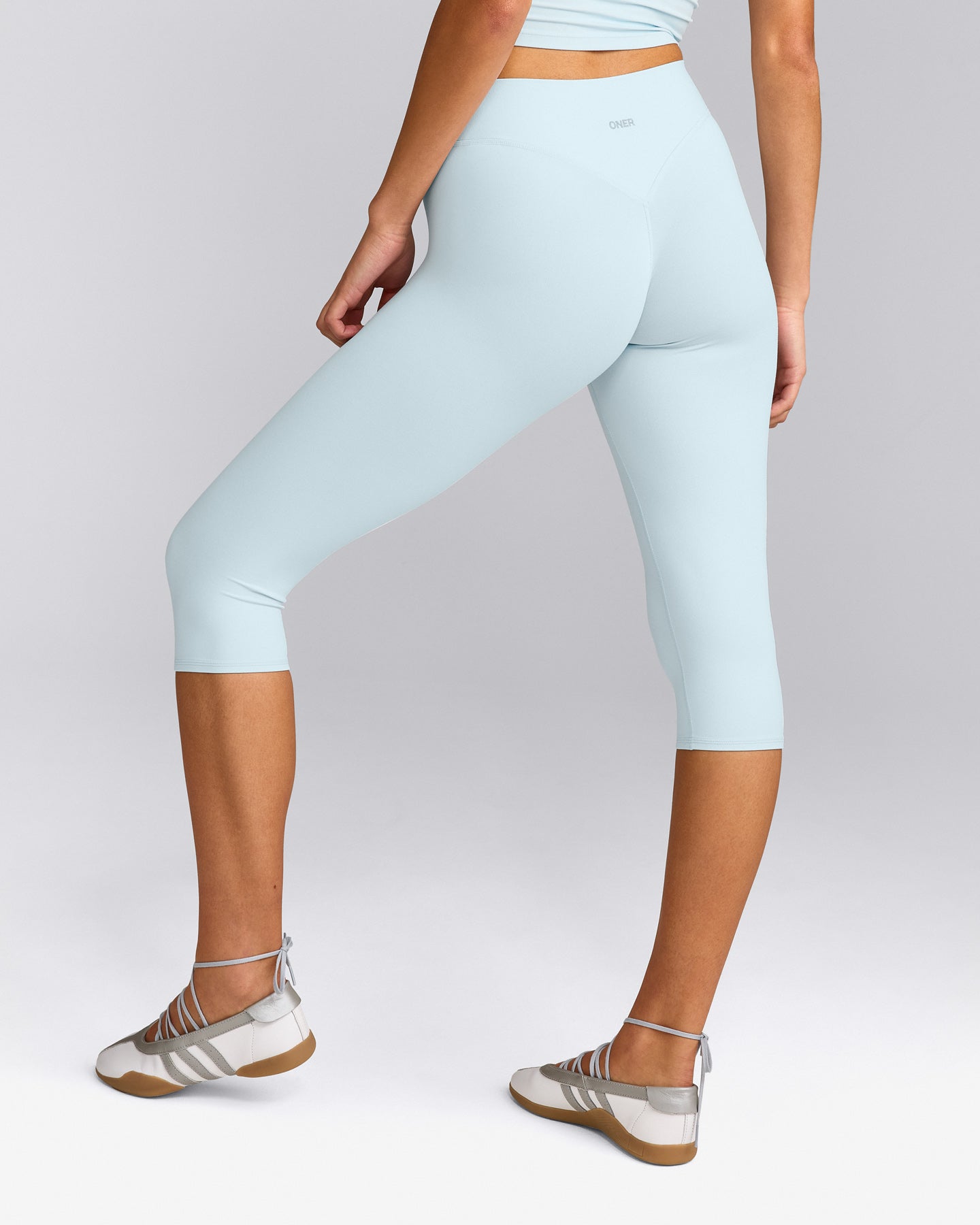 SoftMotion™ High Waisted Capri Leggings with Gray Logo | Cloud Blue
