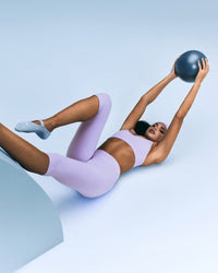 SoftMotion™ High Waisted Capri Leggings with Gray Logo | Lavender Purple