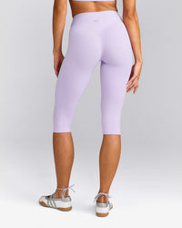 SoftMotion™ High Waisted Capri Leggings with Gray Logo | Lavender Purple