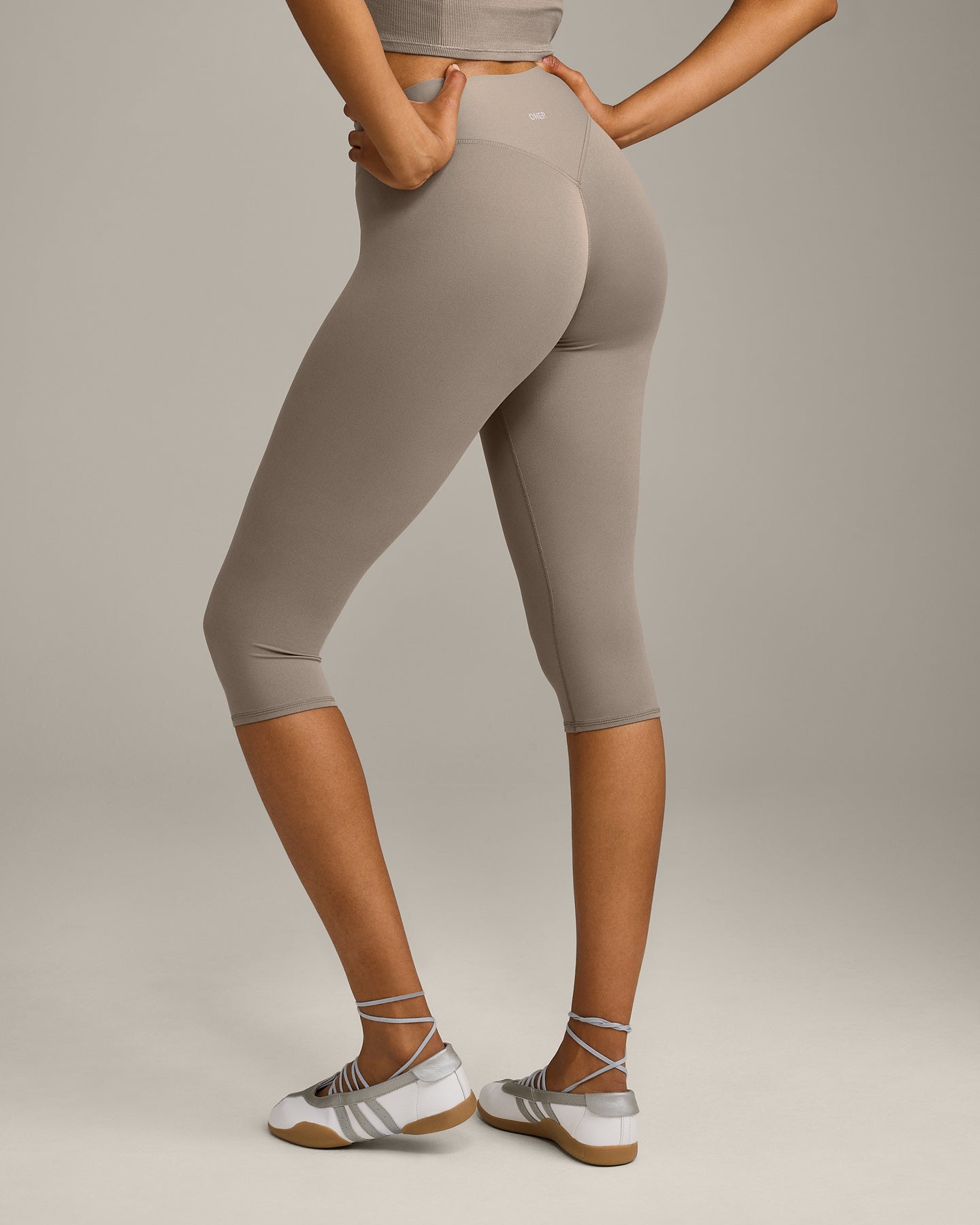 SoftMotion™ High Waisted Capri Leggings with Gray Logo | Minky