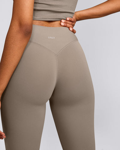 SoftMotion™ High Waisted Capri Leggings with Gray Logo | Minky