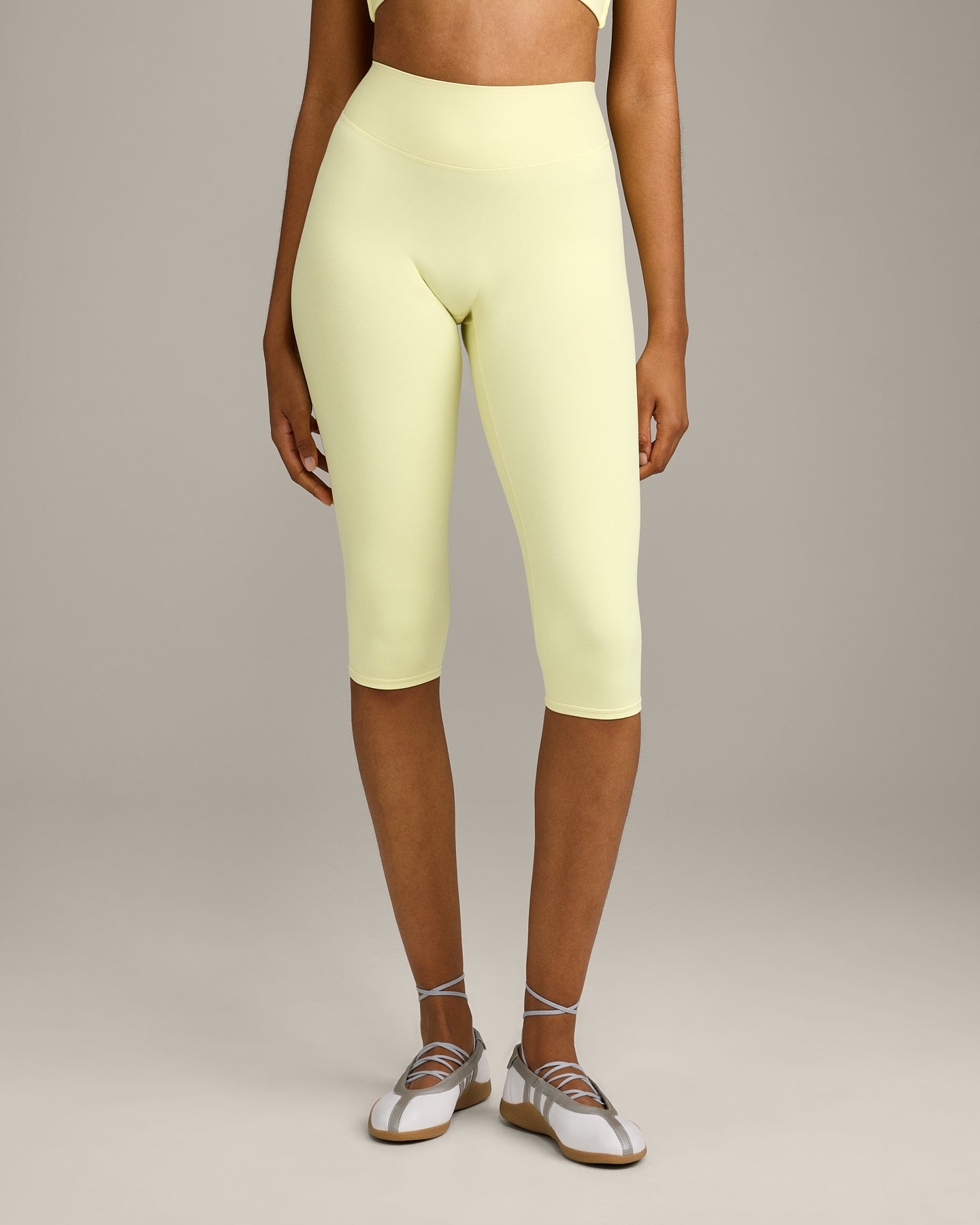 SoftMotion™ High Waisted Capri Leggings with Gray Logo | Pastel Yellow