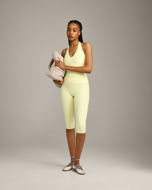 SoftMotion™ High Waisted Capri Leggings with Gray Logo | Pastel Yellow
