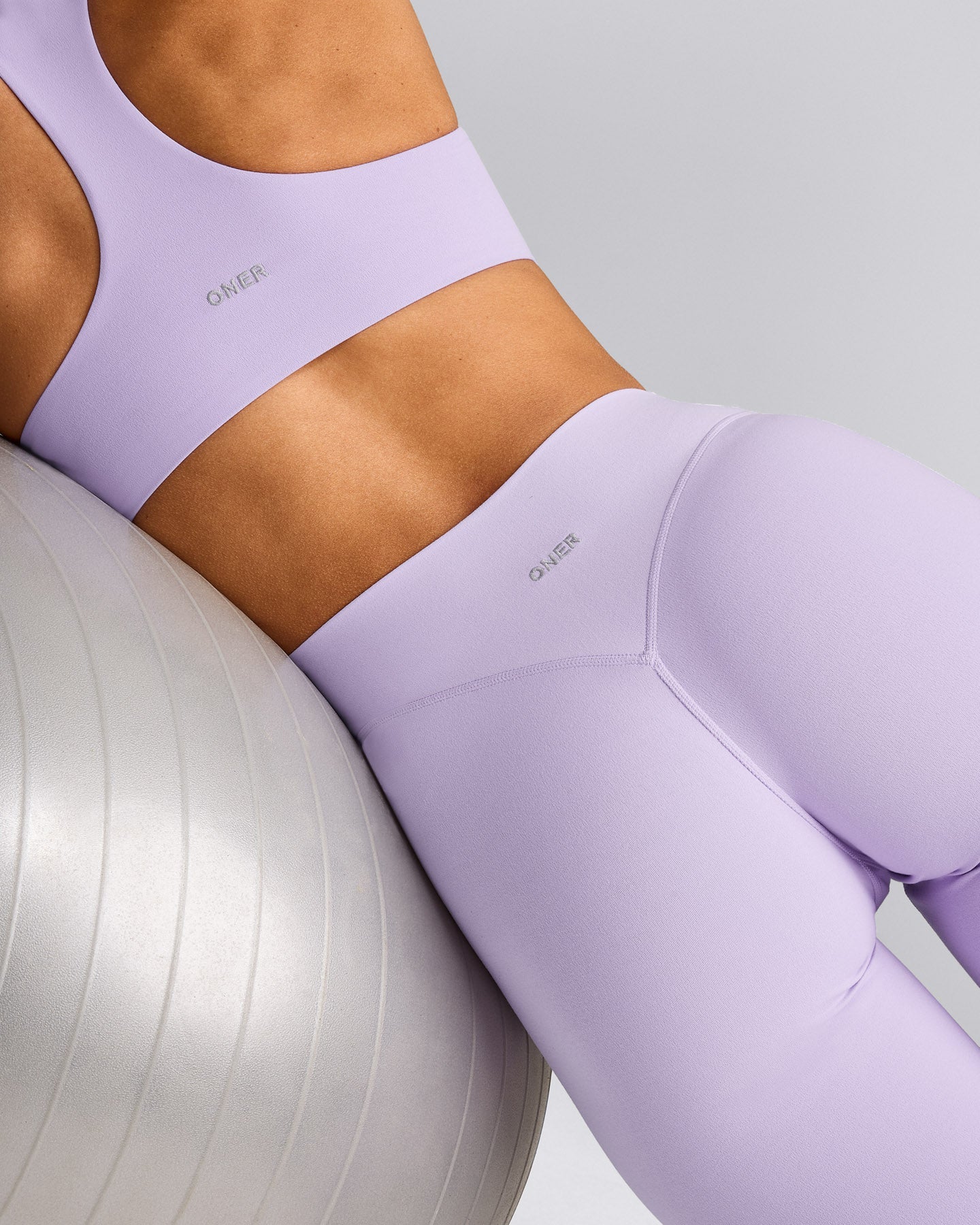 SoftMotion™ Flared Pants with Gray Logo | Lavender Purple
