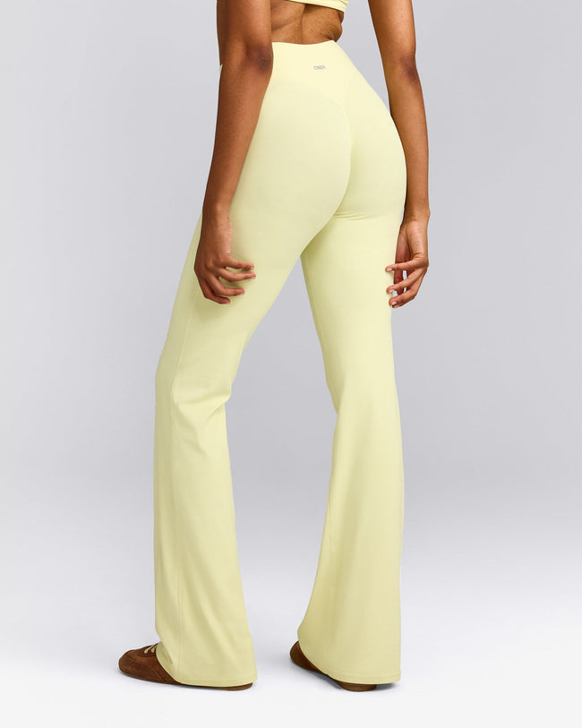 SoftMotion™ Flared Pants with Gray Logo | Pastel Yellow