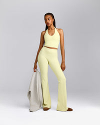 SoftMotion™ Flared Pants with Gray Logo | Pastel Yellow