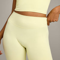 SoftMotion™ Flared Pants with Gray Logo | Pastel Yellow