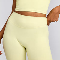 SoftMotion™ Flared Pants with Gray Logo | Pastel Yellow