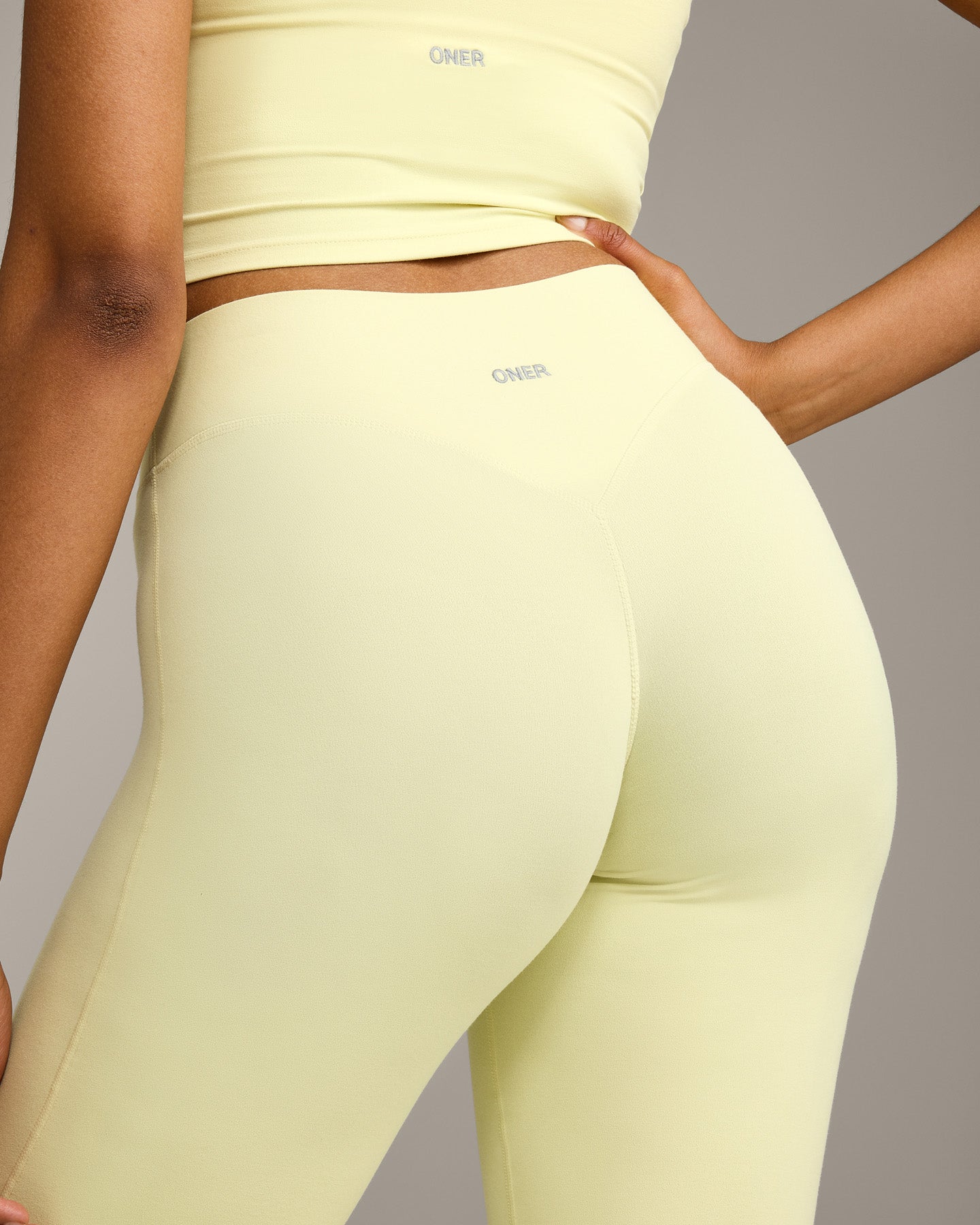 SoftMotion™ Flared Pants with Gray Logo | Pastel Yellow