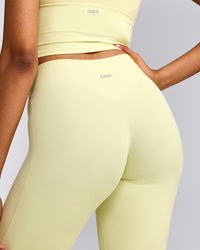 SoftMotion™ Flared Pants with Gray Logo | Pastel Yellow