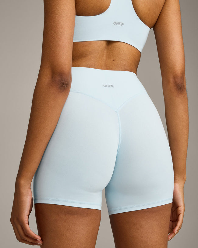 SoftMotion™ High Waisted Shorts 6" with Gray Logo | Cloud Blue
