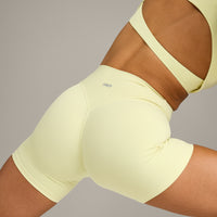 SoftMotion™ High Waisted Shorts 6" with Gray Logo | Pastel Yellow