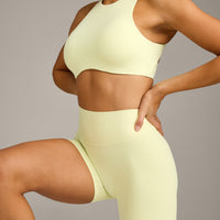 SoftMotion™ High Waisted Shorts 6" with Gray Logo | Pastel Yellow