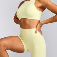 SoftMotion™ High Waisted Shorts 6" with Gray Logo | Pastel Yellow