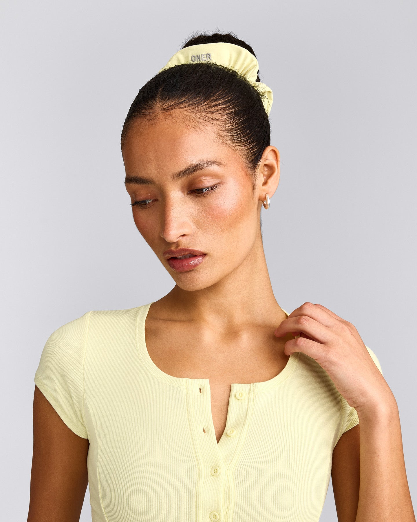 SoftMotion™ Scrunchie with Gray Logo | Pastel Yellow