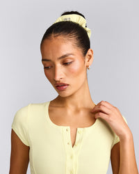 SoftMotion™ Scrunchie with Gray Logo | Pastel Yellow