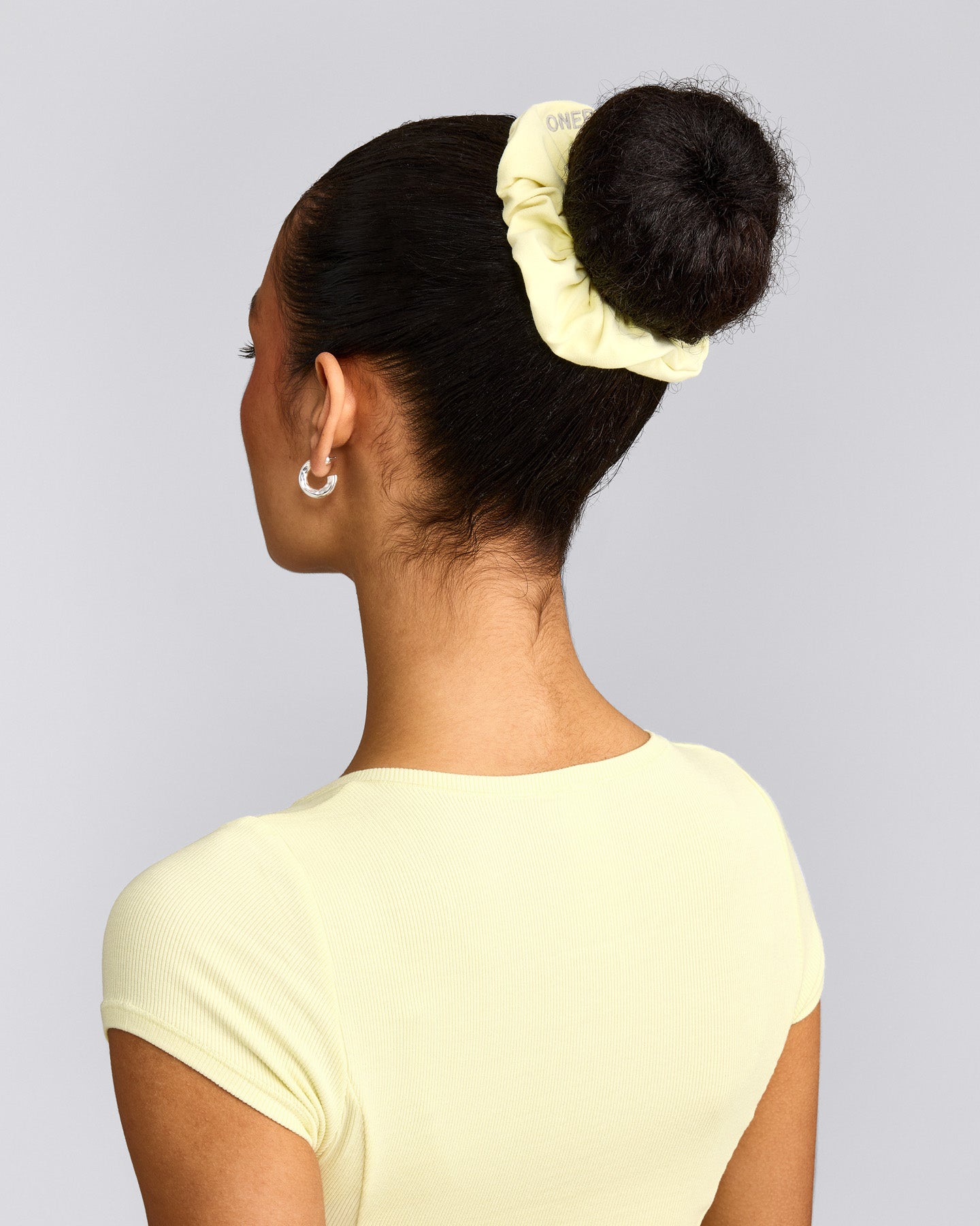 SoftMotion™ Scrunchie with Gray Logo | Pastel Yellow