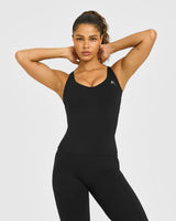 Unified V Neck Cross Back Vest White Logo | Black