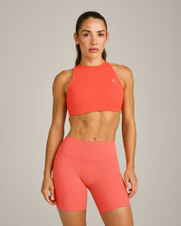 EasyLift™ High Neck Sports Bra with Gray Logo | Hyper Orange