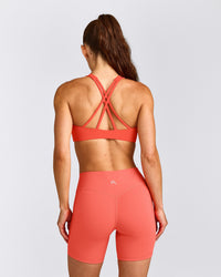 EasyLift™ High Neck Sports Bra with Gray Logo | Hyper Orange