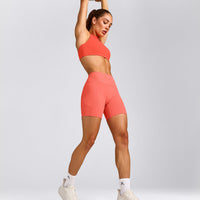 EasyLift™ High Neck Sports Bra with Gray Logo | Hyper Orange