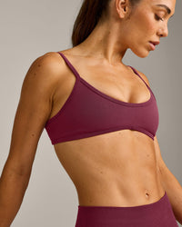 EnhanceLift™ Seamless Minimal Bralette with Gray Logo | Burnt Maroon Red