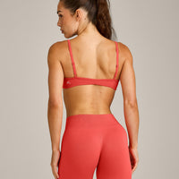 EnhanceLift™ Seamless Minimal Bralette with Gray Logo | Dark Charged Coral