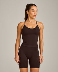 EnhanceLift™ Seamless Strappy Racer Tank Top with Built in Bra Shelf with Gray Logo | 70% Cocoa