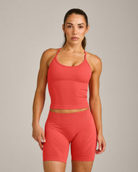 EnhanceLift™ Seamless Strappy Racer Tank Top with Built in Bra Shelf with Gray Logo | Dark Charged Coral