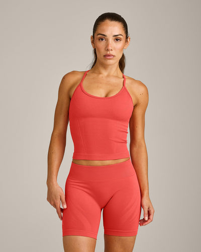 EnhanceLift™ Seamless Strappy Racer Tank Top with Built in Bra Shelf with Gray Logo | Dark Charged Coral