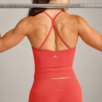 EnhanceLift™ Seamless Strappy Racer Tank Top with Built in Bra Shelf with Gray Logo | Dark Charged Coral