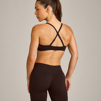 EnhanceLift™ Seamless Strappy Sports Bra with Gray Logo | 70% Cocoa
