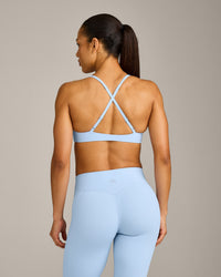 UnifiedMove™ Cross Back Sports Bra with Reflective Logo | Powdered Blue
