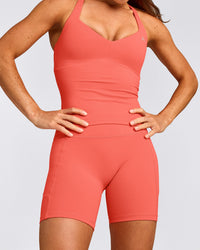 UnifiedMove™ T Back Mid Tank Top with Built in Bra Shelf with Reflective Logo | Light Charged Coral