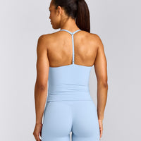 UnifiedMove™ T Back Mid Tank Top with Built in Bra Shelf with Reflective Logo | Powdered Blue