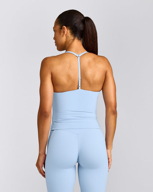 UnifiedMove™ T Back Mid Tank Top with Built in Bra Shelf | Powdered Blue
