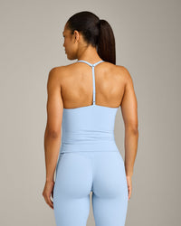UnifiedMove™ T Back Mid Tank Top with Built in Bra Shelf with Reflective Logo | Powdered Blue