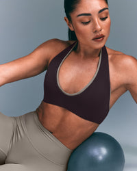 SoftMotion™ Minimal Halter Neck Bralette with Gray Logo | Dark Umber Brown