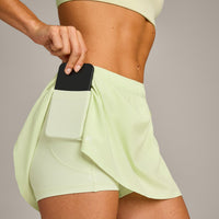 AirMove™ Skort with Pockets New Branding | Meadow Mist Green