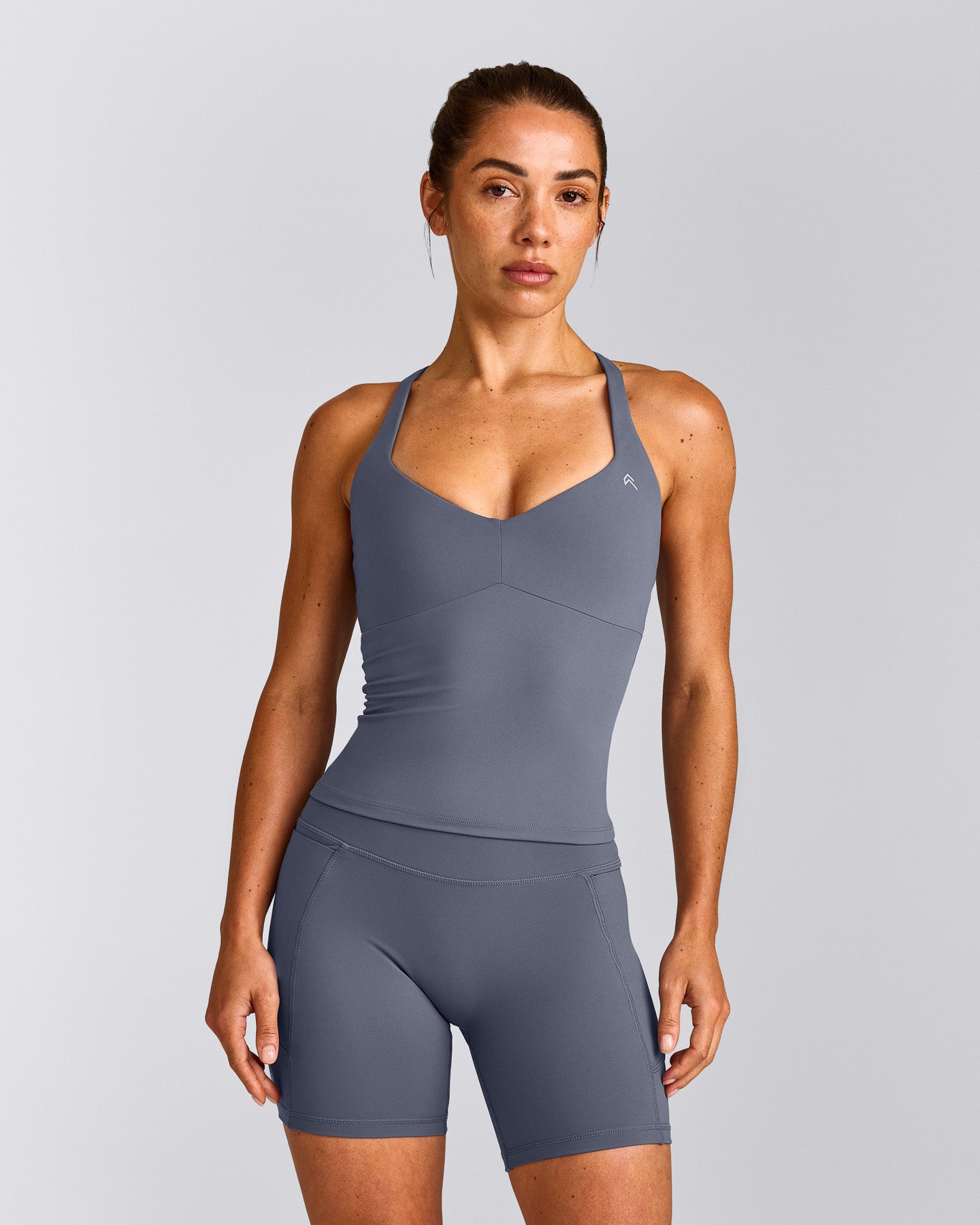 UnifiedMove™ T Back Mid Tank Top with Built in Bra Shelf | Granite Blue