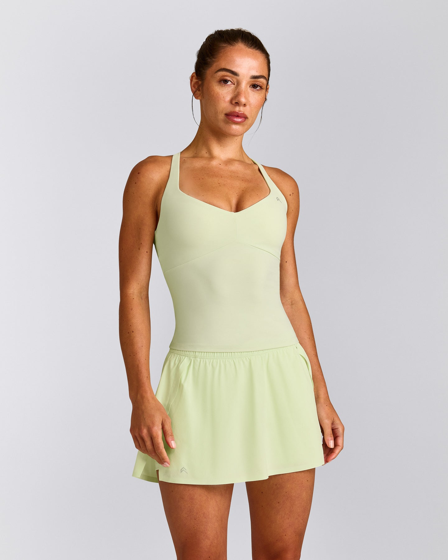 UnifiedMove™ T Back Mid Tank Top with Built in Bra Shelf New Branding | Meadow Mist Green