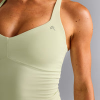 UnifiedMove™ T Back Mid Tank Top with Built in Bra Shelf New Branding | Meadow Mist Green